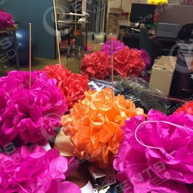 Building paper flowers and umbrellas in our office...