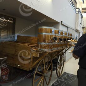 Our western themed soda fountain can be provided with or without a cover on the wagon...  Without the cover it works great for oktoberfest events and many themes...