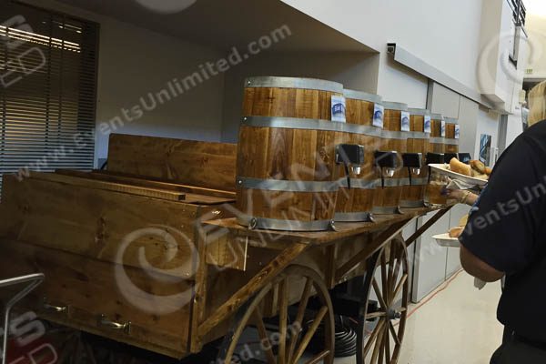 Our western themed soda fountain can be provided with or without a cover on the wagon...  Without the cover it works great for oktoberfest events and many themes...