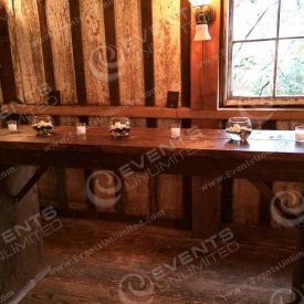 These rustic bar tables we had custom made- they are the perfect rustic standing table option- available in larger quantities for bigger groups.